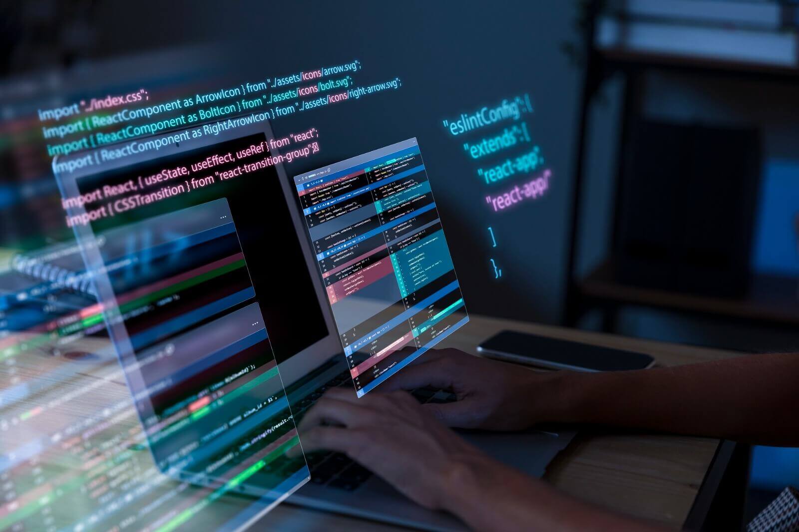 laptop with floating code in front of the screen
